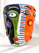 Multi-face ceramic vase